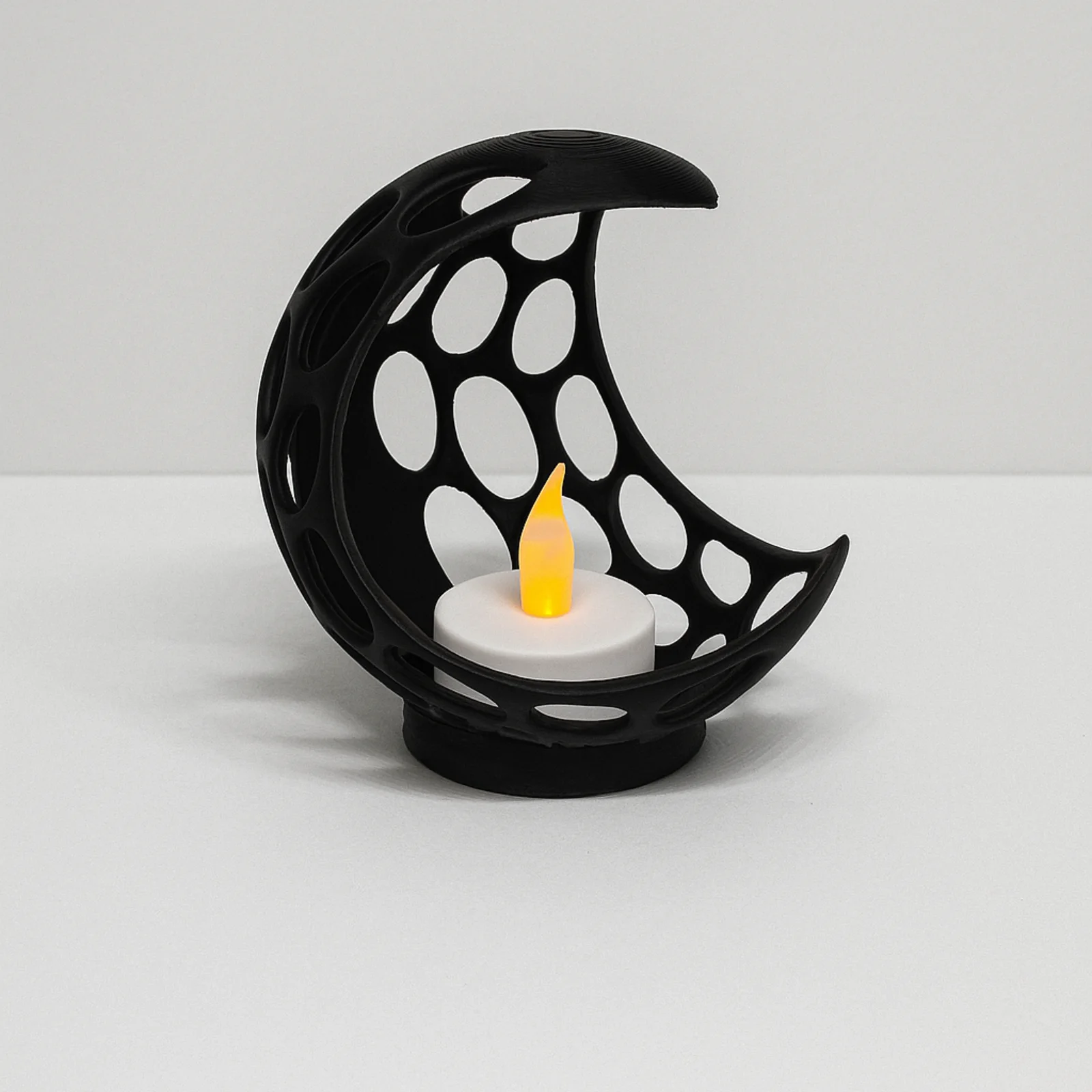 Abstracte halve maan met LED-theelicht - foto 1